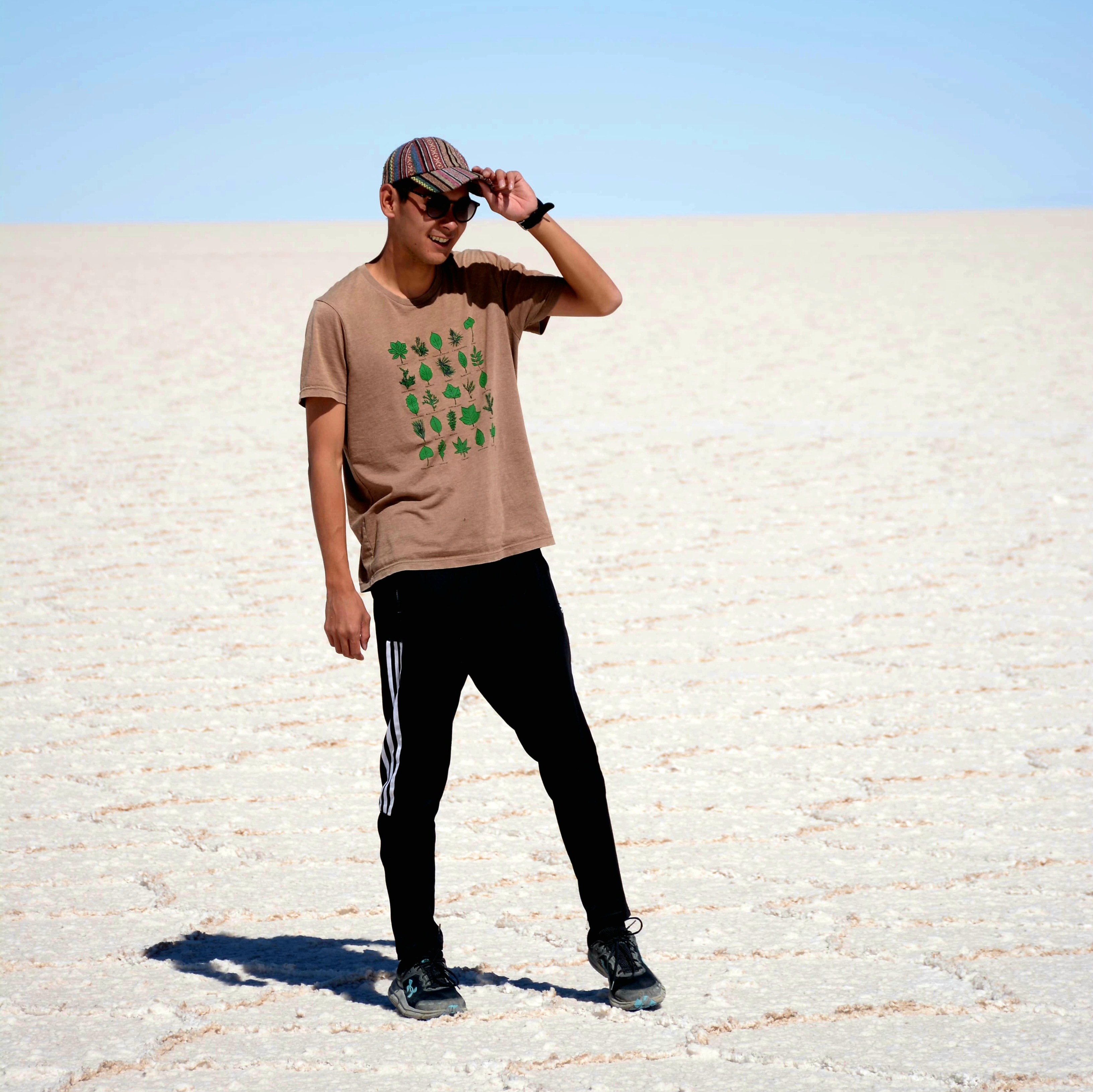 Yutaro Sakairi standing on a salt flat during a solo trip through South America